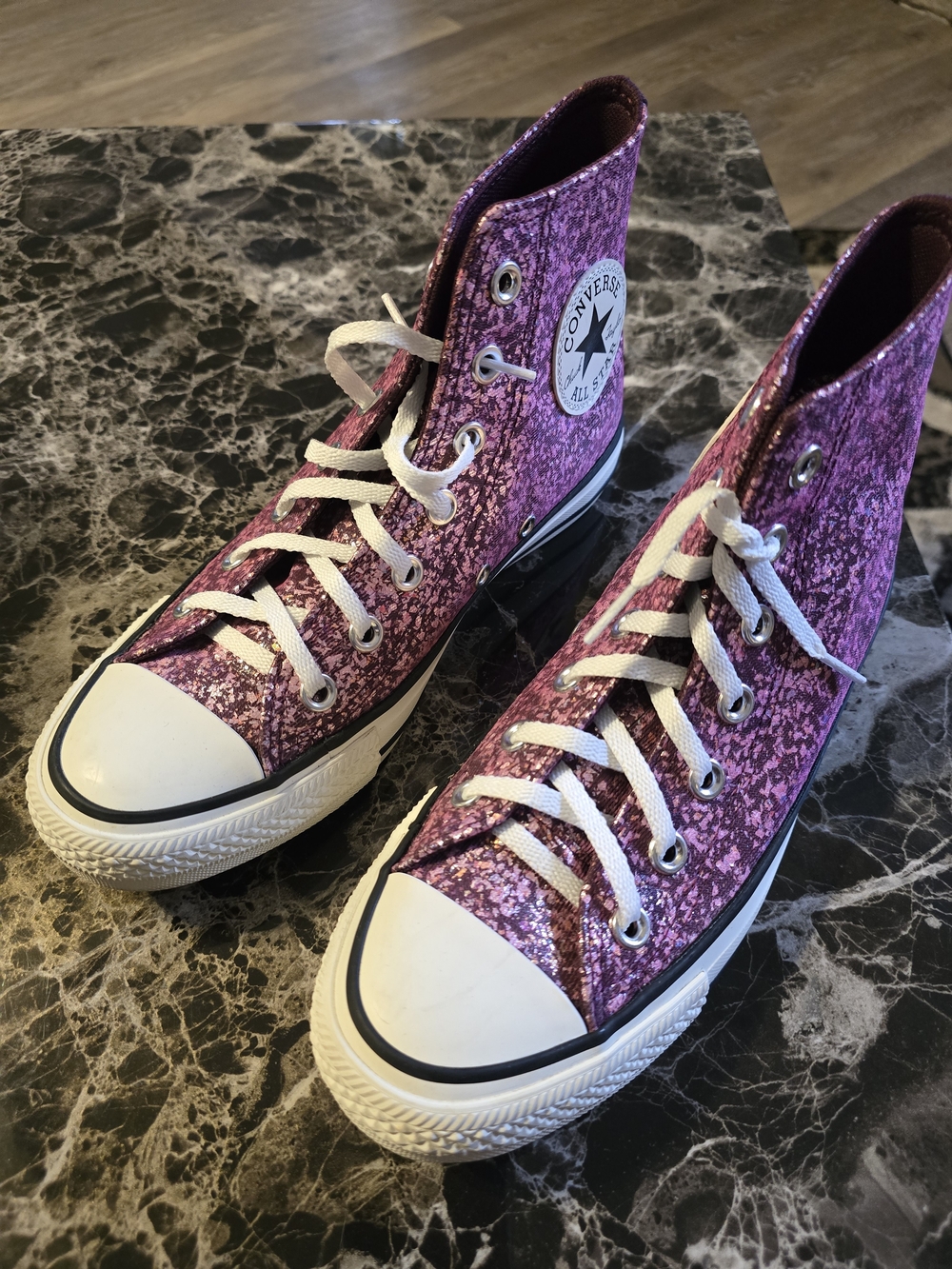 Converse Women’s High Top Glitter Sneakers in Pink